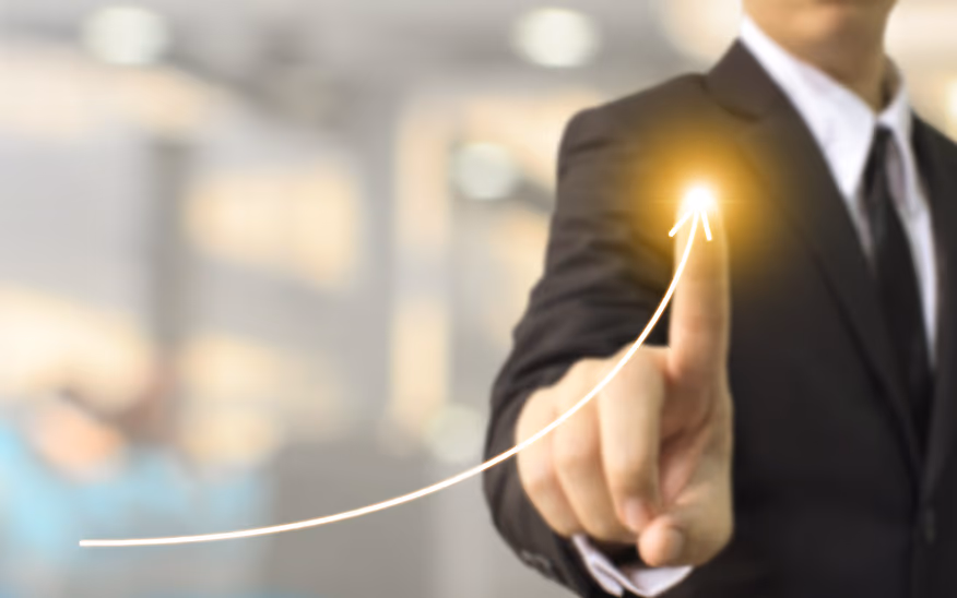 Businessman showing upward trend